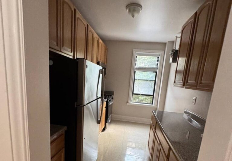 Renovated kitchen with new cabinets and stainless steel appliances | United City Construction